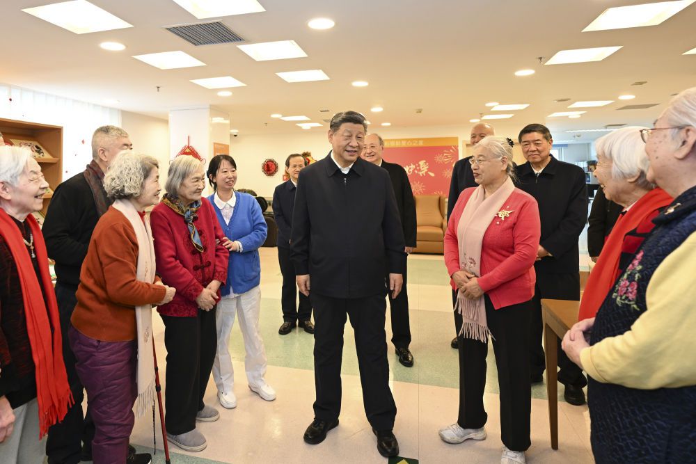 新华图讯｜习近平春节前夕在北京看望慰问基层干部群众(图3)